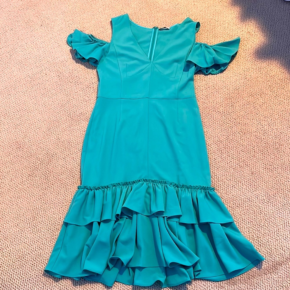 This Tome NYC dress is bright blue and perfect for any occasion!